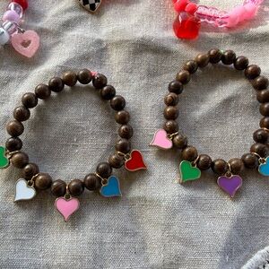 Brown wood bracelet with heart charms